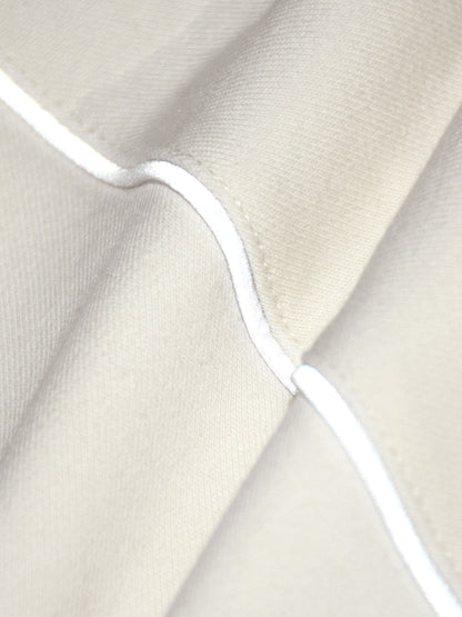 AGAINST MODERN FOOTBALL - CHAQUETA CON CREMALLERA Y DETALLES REFLECTANTES