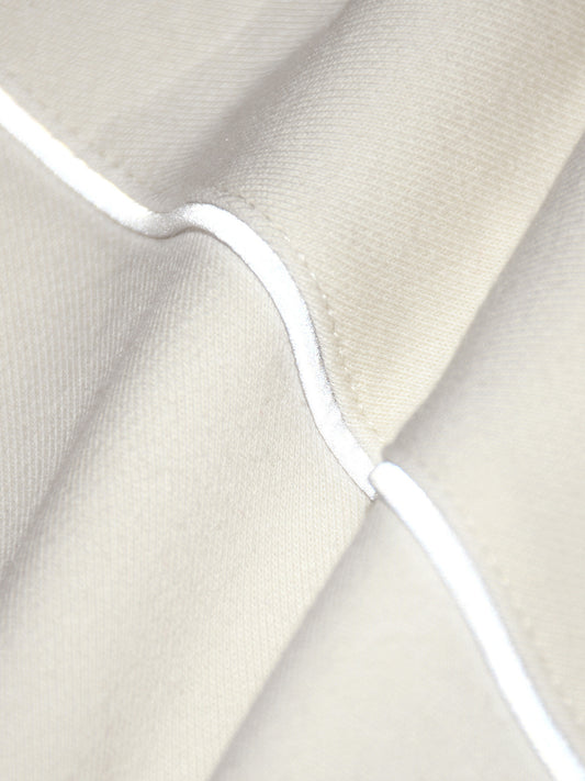 AGAINST MODERN FOOTBALL - CHAQUETA CON CREMALLERA Y DETALLES REFLECTANTES